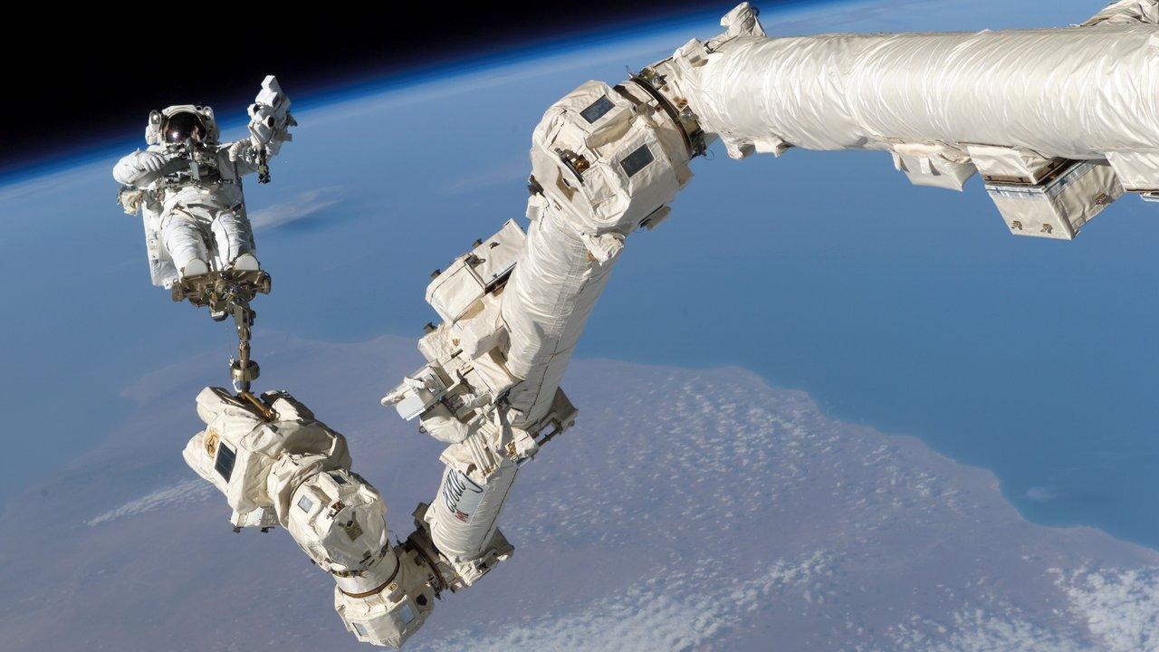 Professor Stephen K. Robinson participates in an extravehicular activity (EVA) on the International Space Station