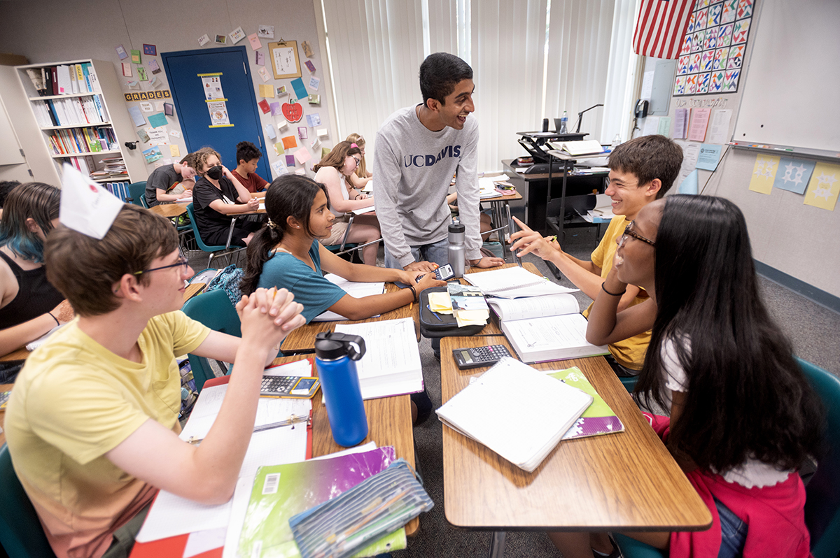 UC Davis student Neeraj Senthil in a classroom with elementary students