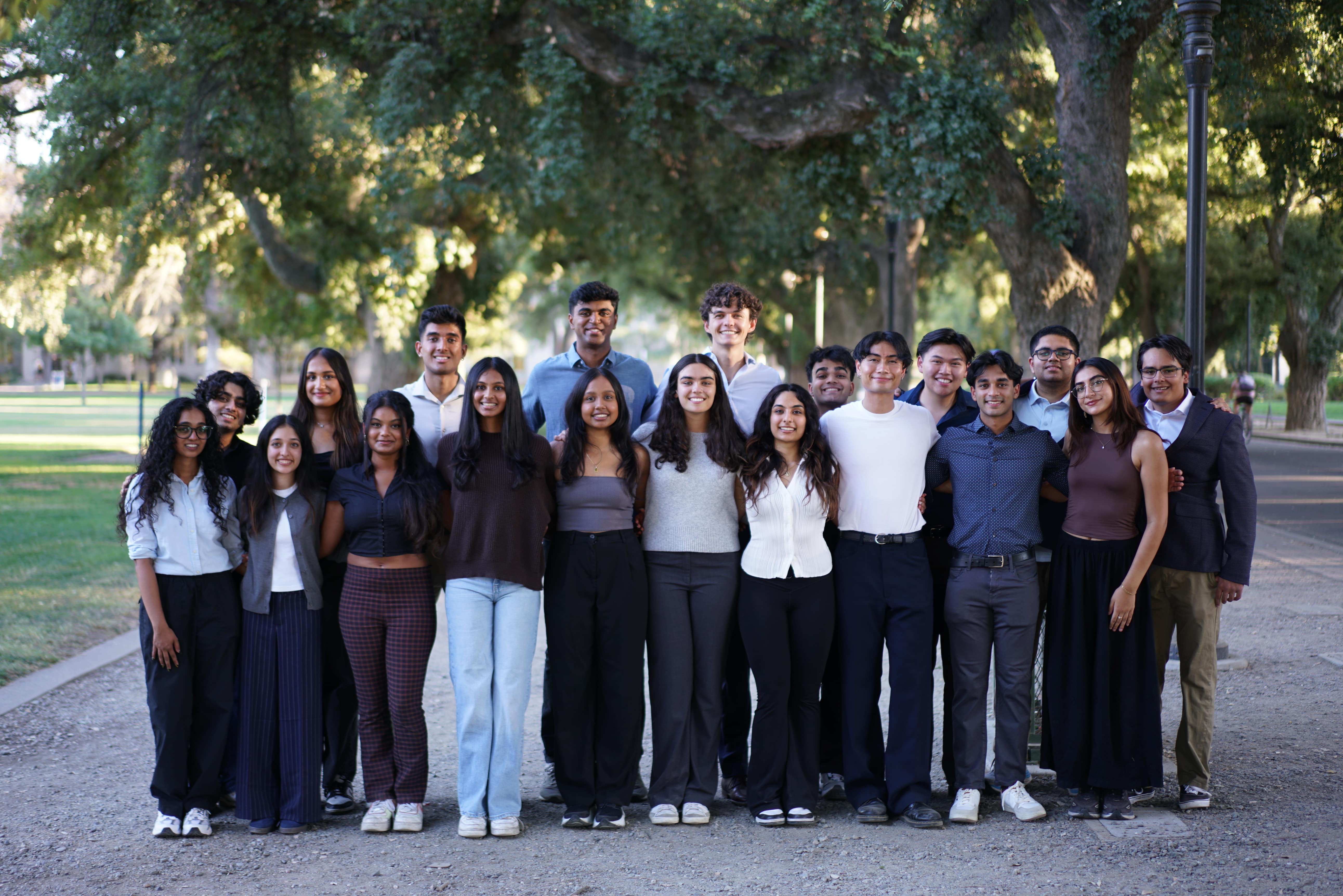 The AI Student Collective Club standing together for a group photo
