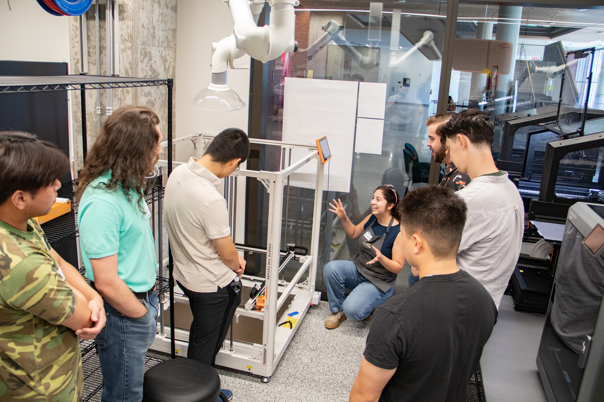 McKenzie receives a tour of Tech Foundry with other students