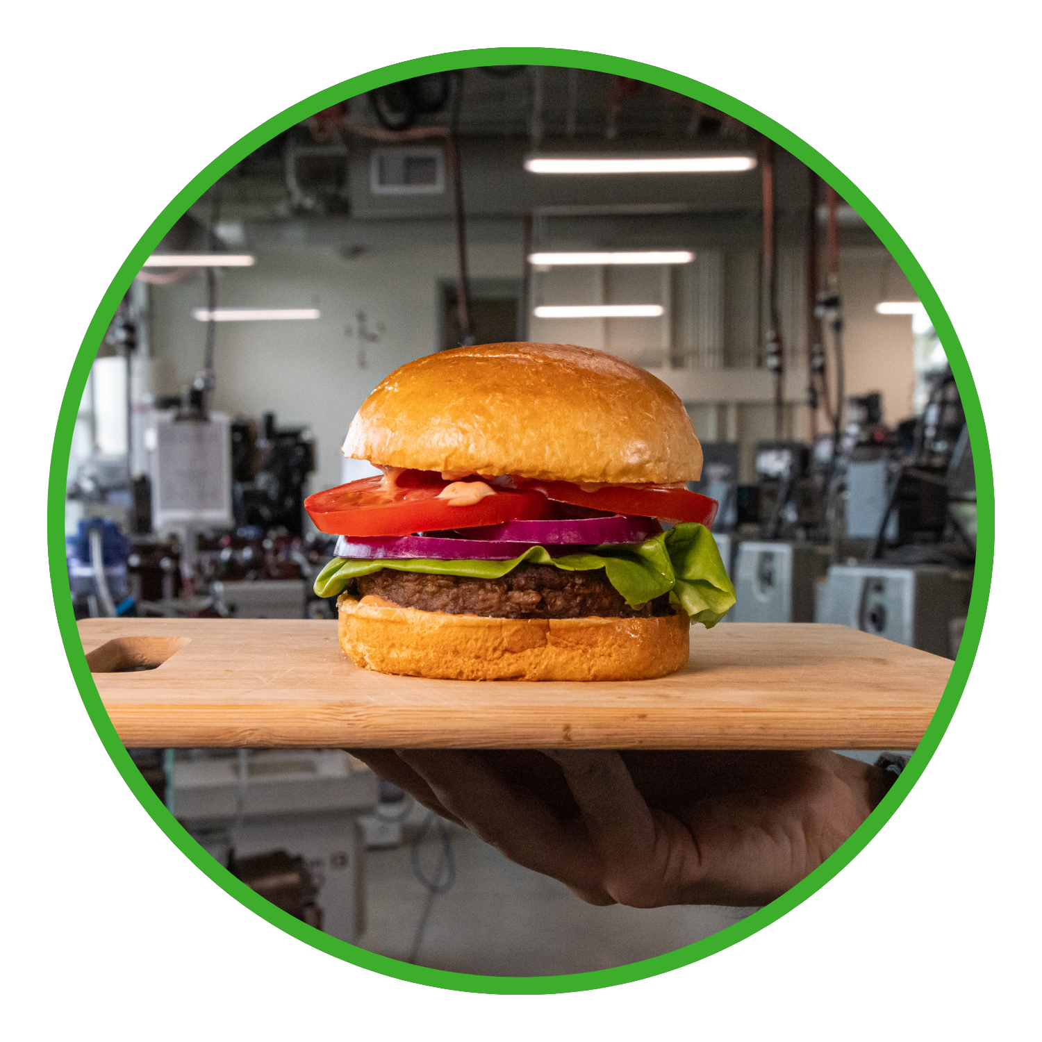 Burger rests on a cutting board in the ESDC