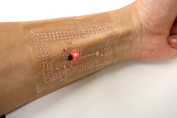 arm with temporary tattoo that displays health information