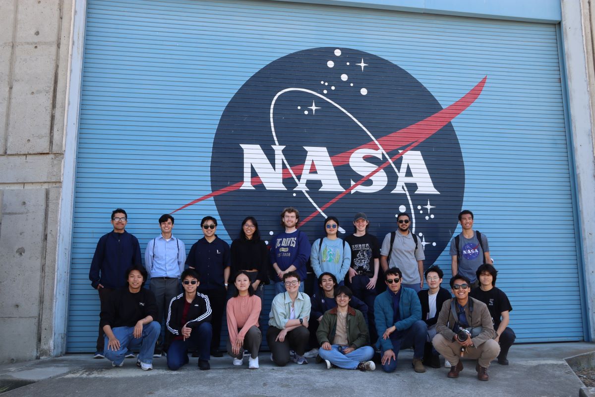 Society poses outside the NASA Ames Research Center