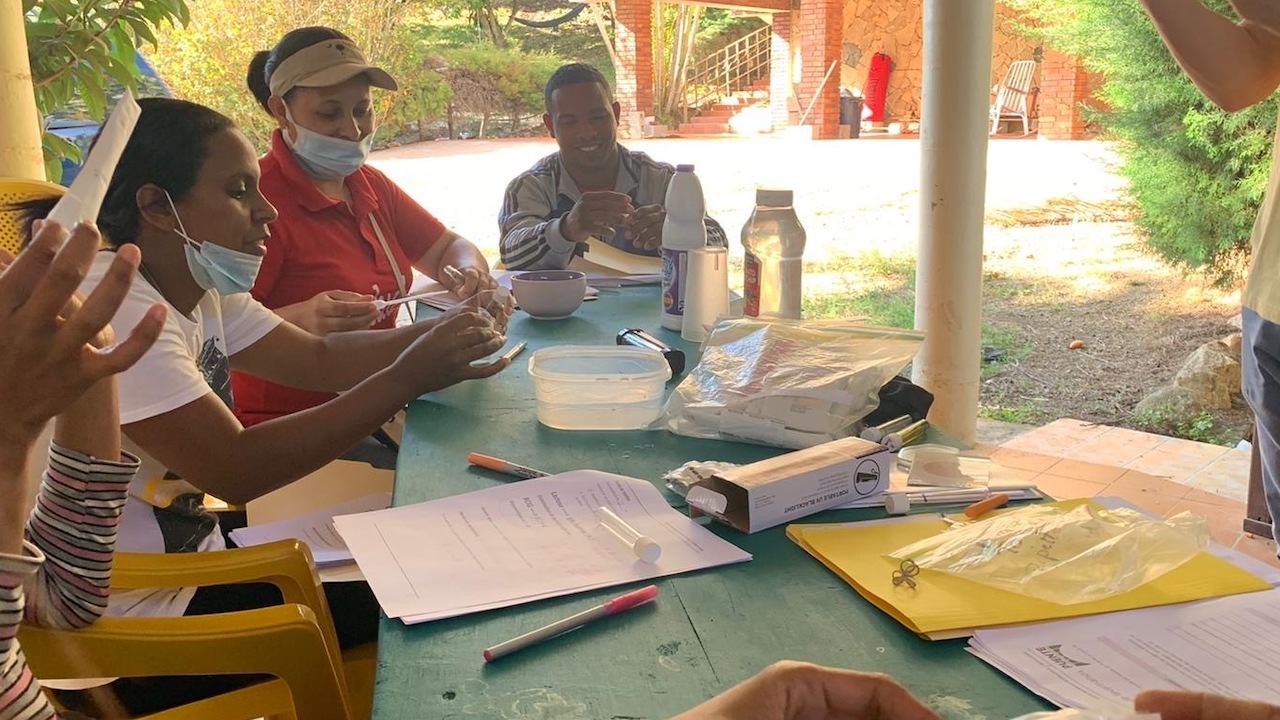 Members of the Puente team participate in a WASH course covering water, sanitation, and health. Courtesy of Tiven Buggy.