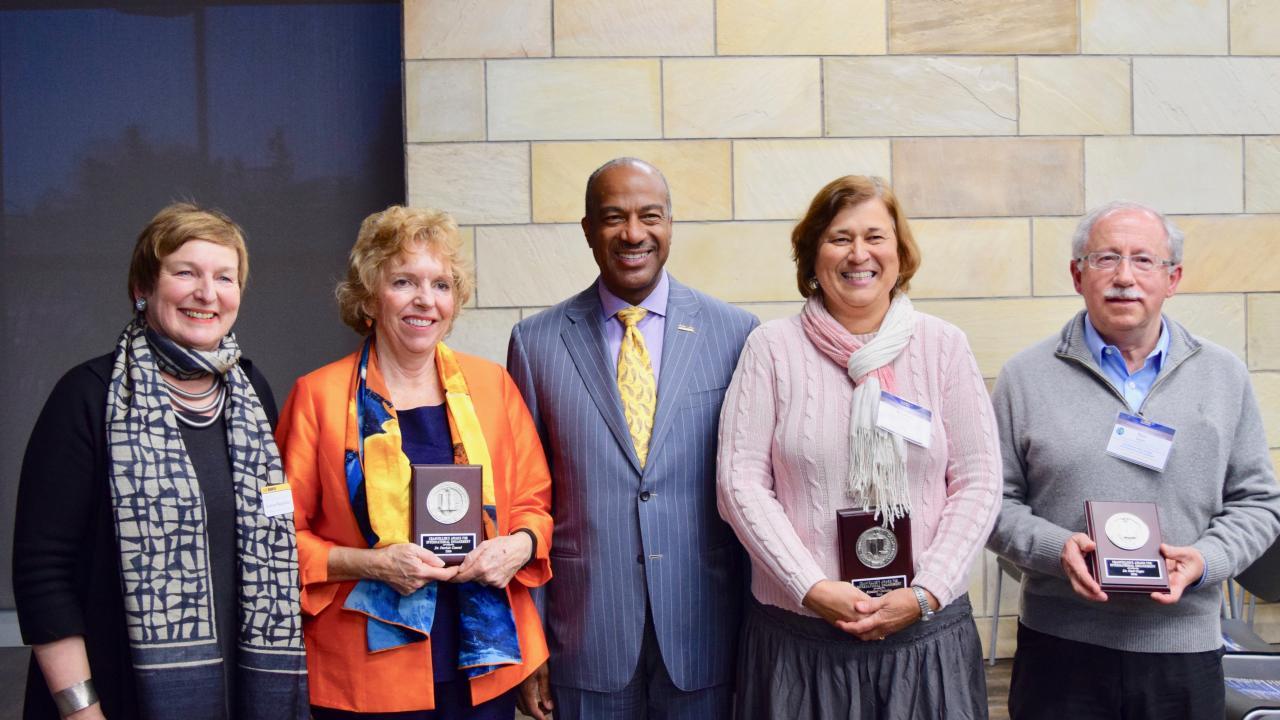 (L-R): Vice Provost and Associate Chancellor Joanna Regulska, Awardee Patricia Conrad, Chancellor Gary S. May, Awardee Rosalind Christian, and Awardee Paul Gepts, at the International Connections Reception at the International Center on March 2.
