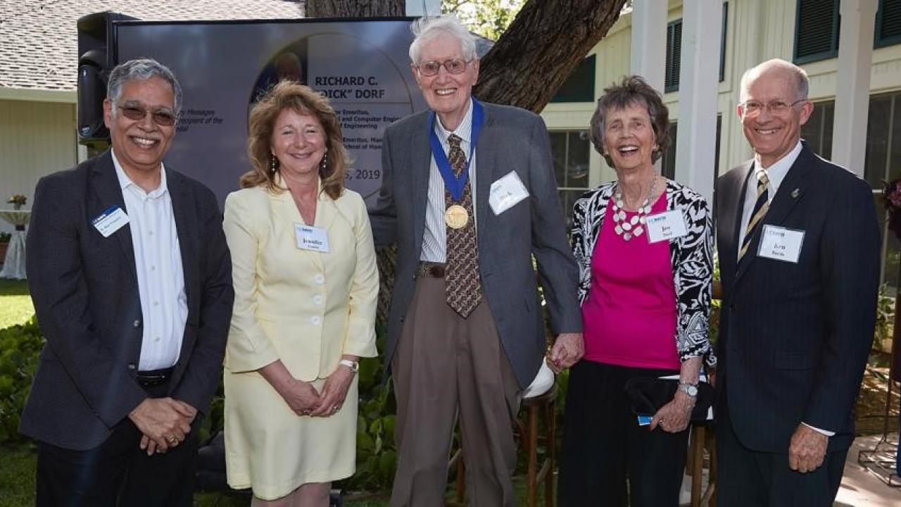 Dick Dorf, center, flanked by, from left: H. Rao Unnava, dean, Graduate School of Management; Jennifer S. Curtis, dean, College of Engineering; his wife, Joy; and Ken Burtis, faculty advisor to the chancellor and provost. (Fred Greaves/UC Davis)
