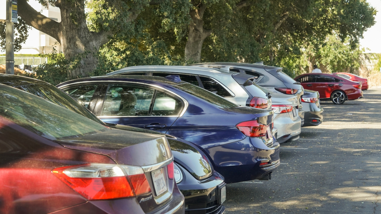 Parked cars lined up in a parking lot