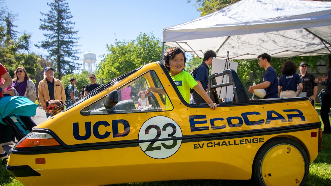 Child sits in ecocar