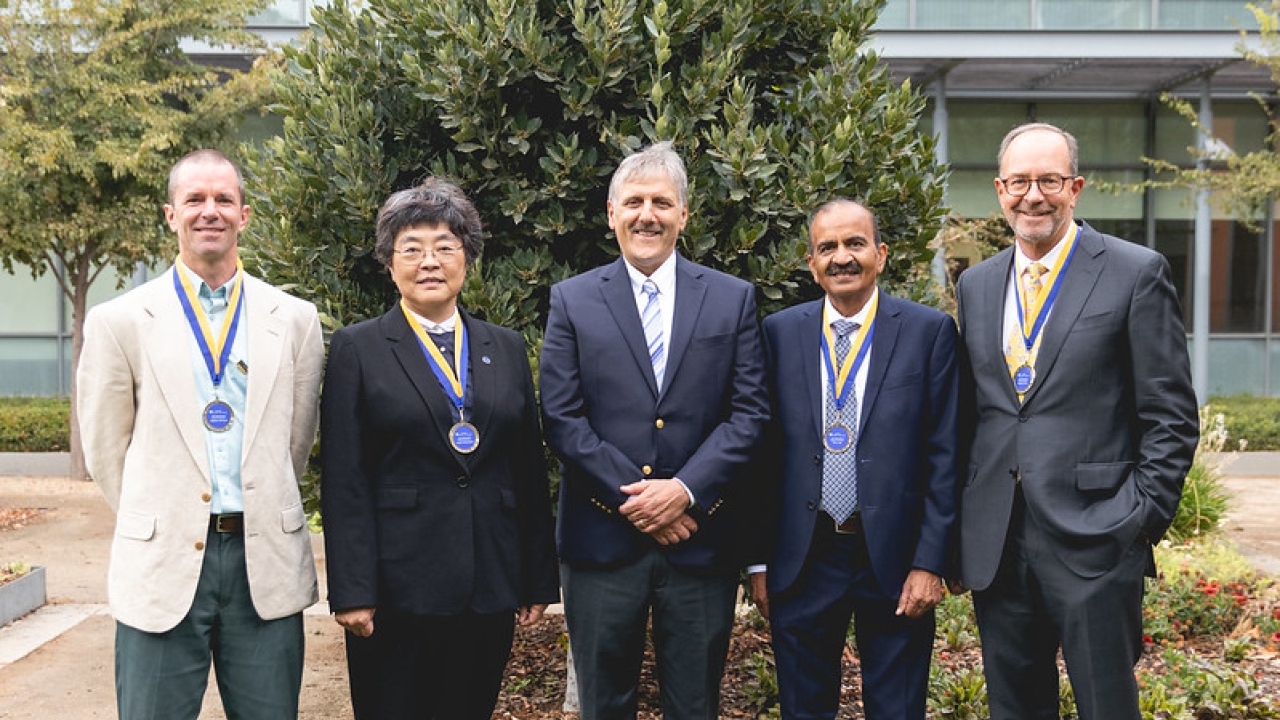 2021 distinguished engineering alumni medal recipients with dean corsi