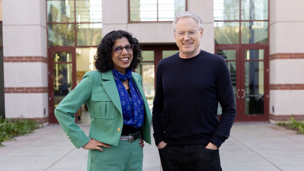 UC Davis College of Engineering Associate Dean of Research Raissa D'Souza, left, with Microsoft Chief Scientific Officer Eric Horvitz. (Mario Rodriguez/UC Davis)