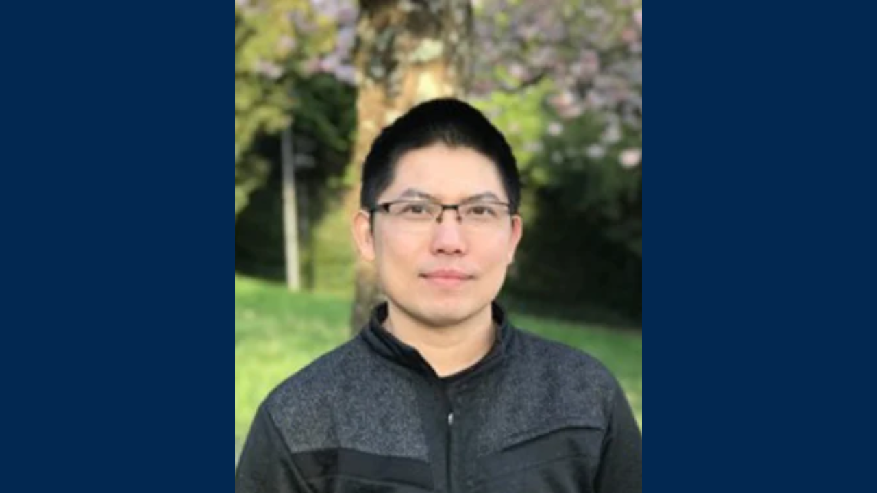 Hoang-Vu Phan on green outdoor background