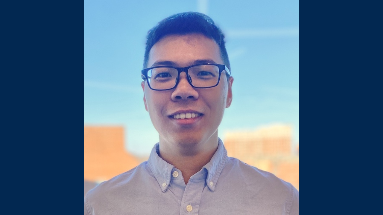 Lifeng Zhou on outdoor background