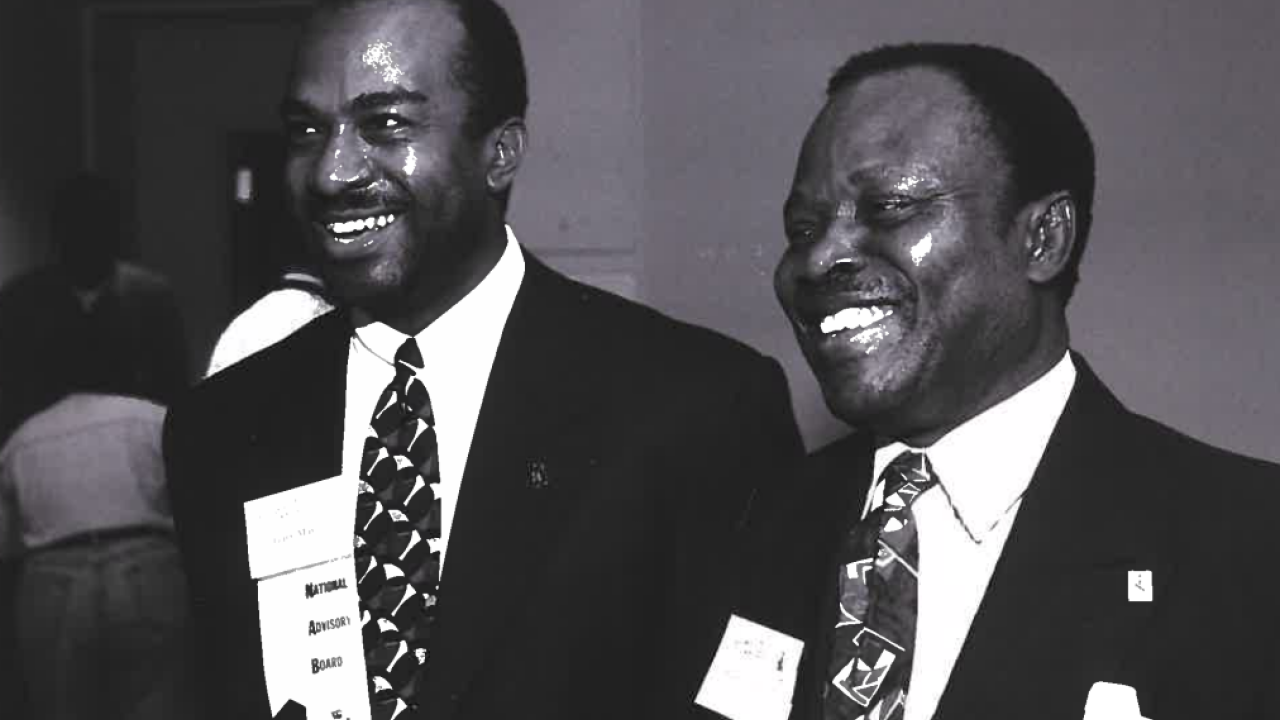 Chancellor Gary S. May and Dr. Augustine Esogbue in a black and white image