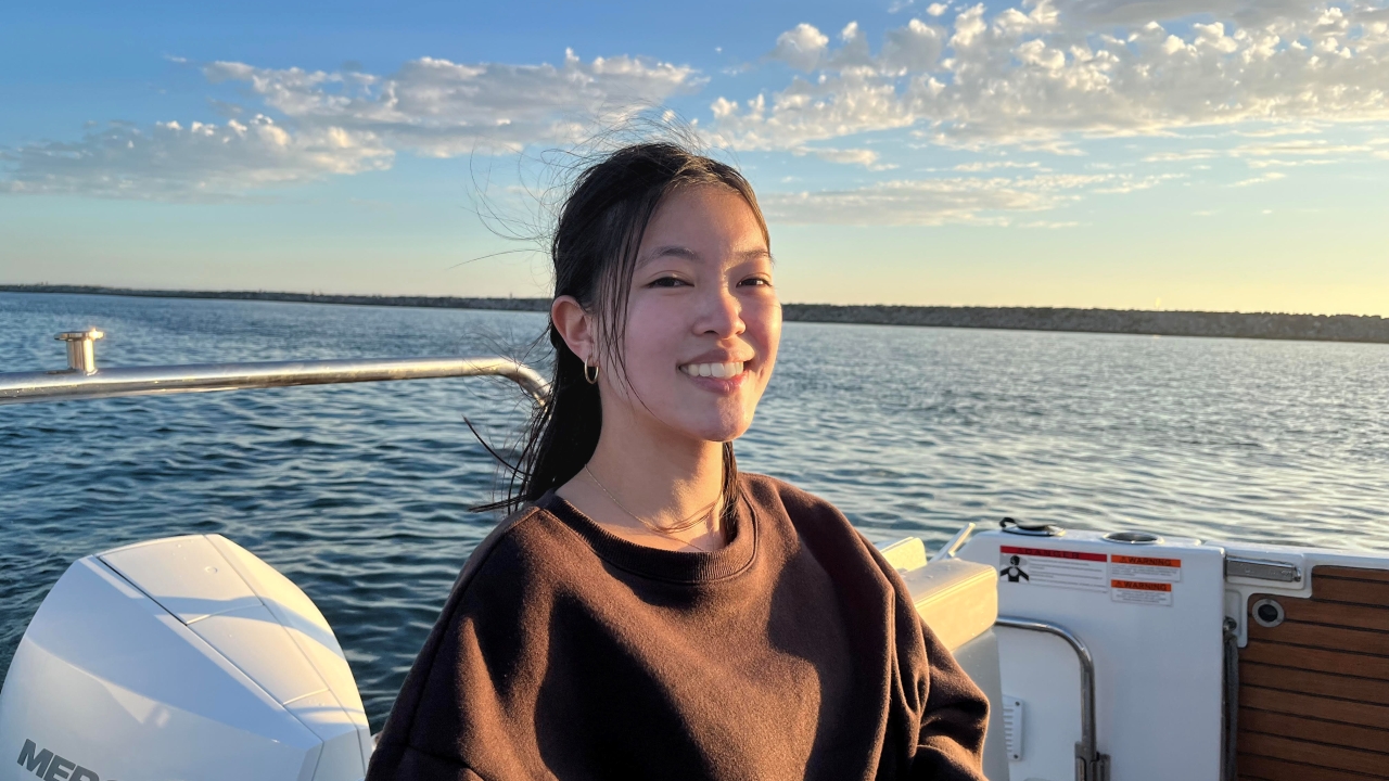 Tiffany Chan outdoors near a body of water