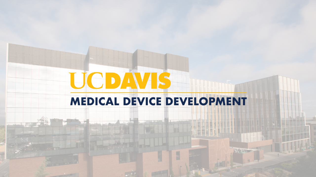The UC Davis logo with the words "Medical Device Development" on a faded background of a large reflective building