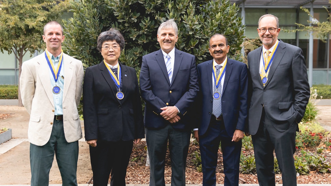 Dean Corsi with 2021 distinguished alumni medal recipients