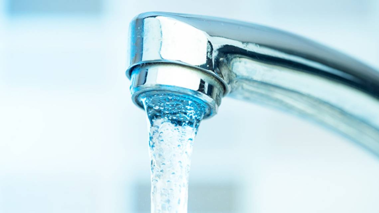 Faucet with clear water coming out of it 