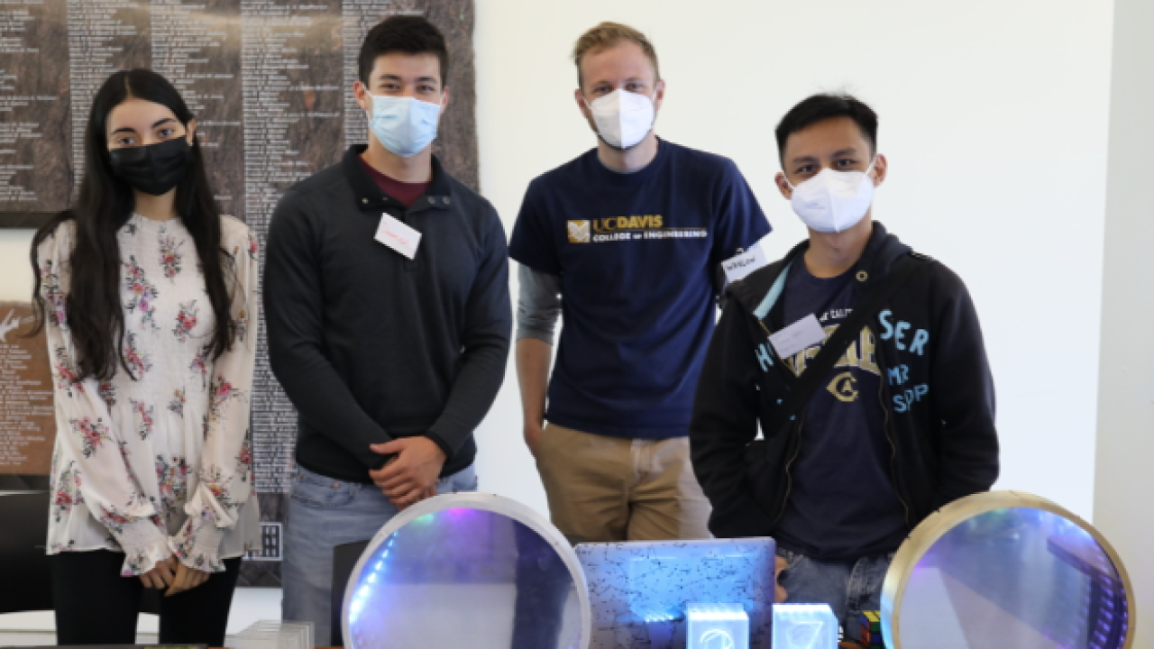 student demonstrating engineering project