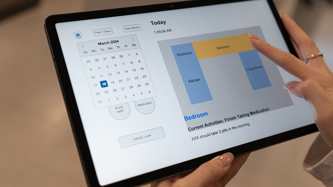 hand holding tablet device