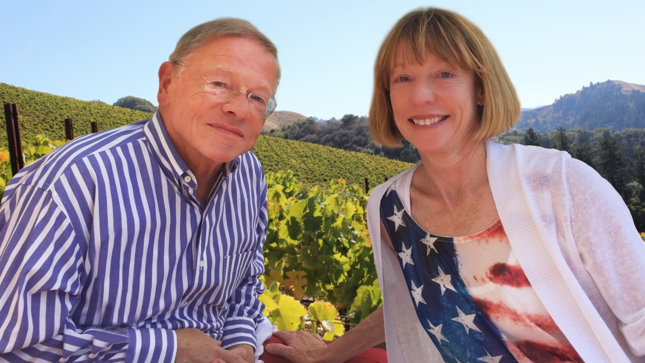 Dr. T.J. Rodgers and his wife Valeta pose for a photo at a vineyard 