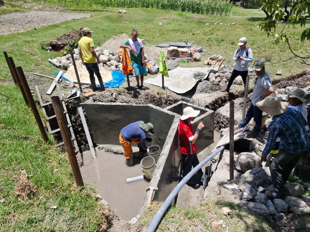 A construction team works in Peru