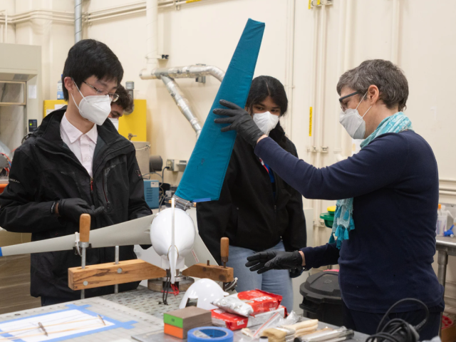 Researchers in a lab show prototype wind turbine blade