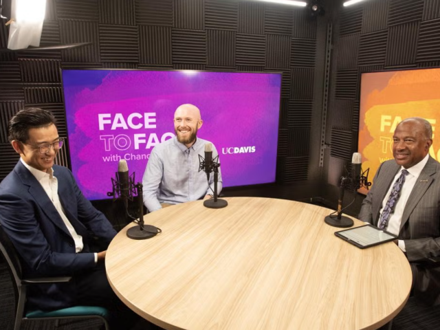 Rain Sun and Sam Louderback sit with Gary May in a podcast studio
