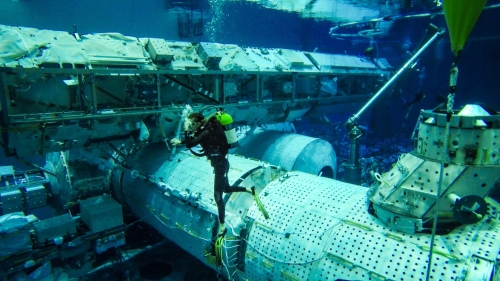 Janine scuba diving in the Neutral Buoyancy Lab