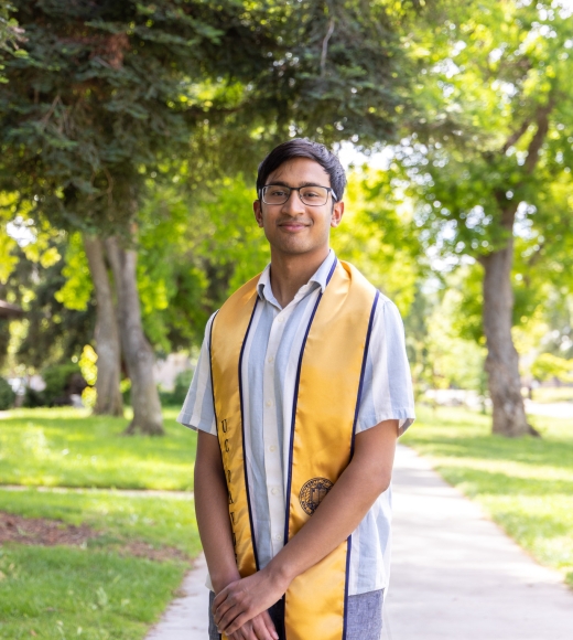 Hari Rakul Ambethkar wearing a UC Davis stole