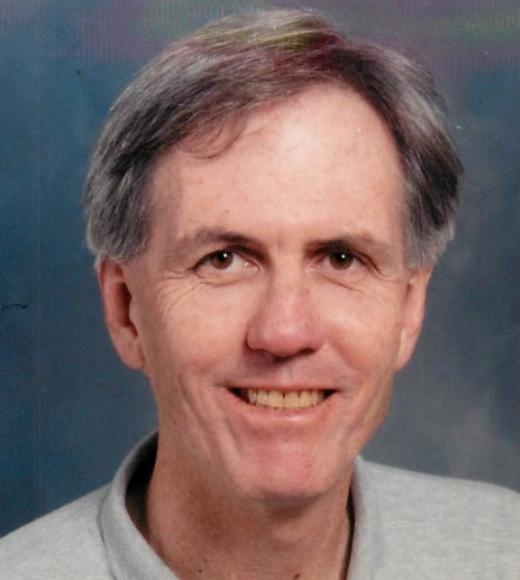 A headshot of Ian M. Kennedy