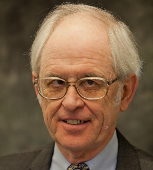 A headshot of James Shackelford