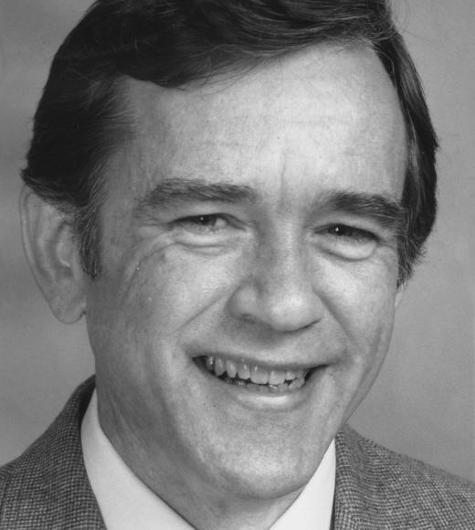 A black and white portrait of R. Larry Merson