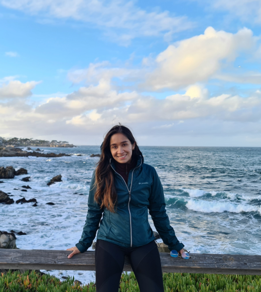 Portrait of Janis Patiño near the ocean