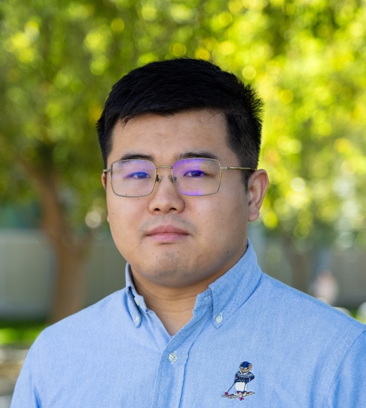 A headshot of Yang Zhou