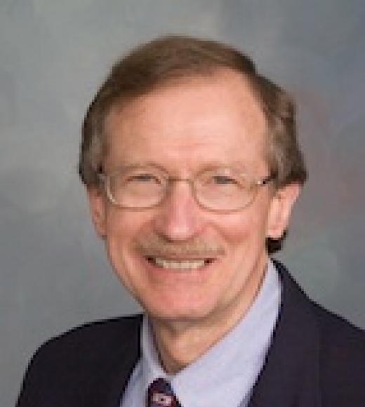 A headshot of John Krochta