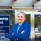 Dean Richard Corsi in front of Kemper Hall Building