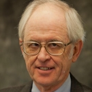 A headshot of James Shackelford