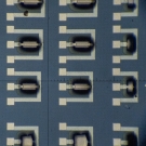 Microscopic view of nanoscale detecors, which look like black and white lines and squares in a geometric pattern on a blue background
