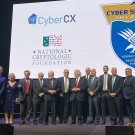 Matt Bishop, center, stands with his fellow 2023 honorees at his induction into the Cyber Security Hall of Fame. (Courtesy Cyber Security Hall of Fame)