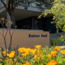Bainer Hall at UC Davis with poppies in bloom
