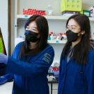 Lin Tian and two students in her lab